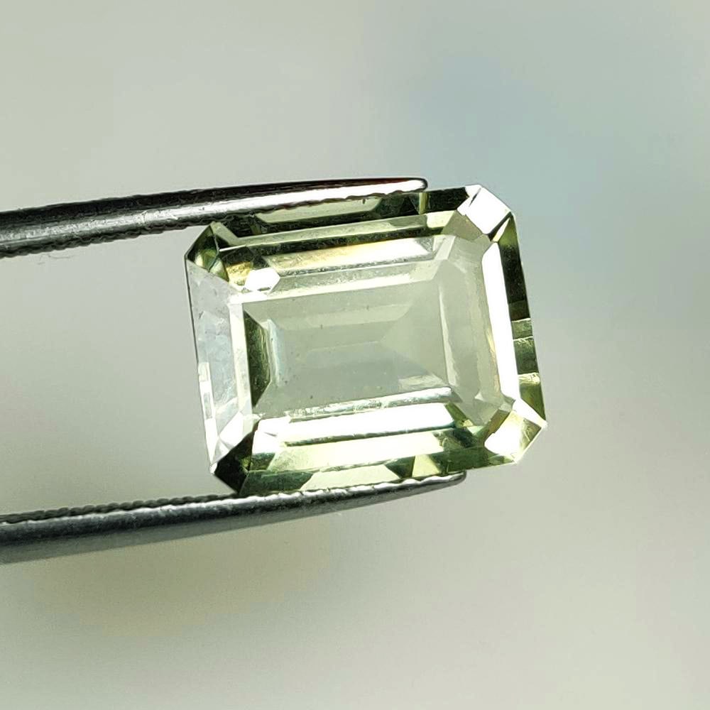 5.23 Ct Natural "Prasiolite" (Green Amethyst)Emerald Cut: Weight - 5.23 Ct / Dimensions - 12.20 x 9.90 x 5.90 mm / Shape -Emerald Cut / Color - Green / Clarity - VVS / Origin -Brazil / Treatment - Heated