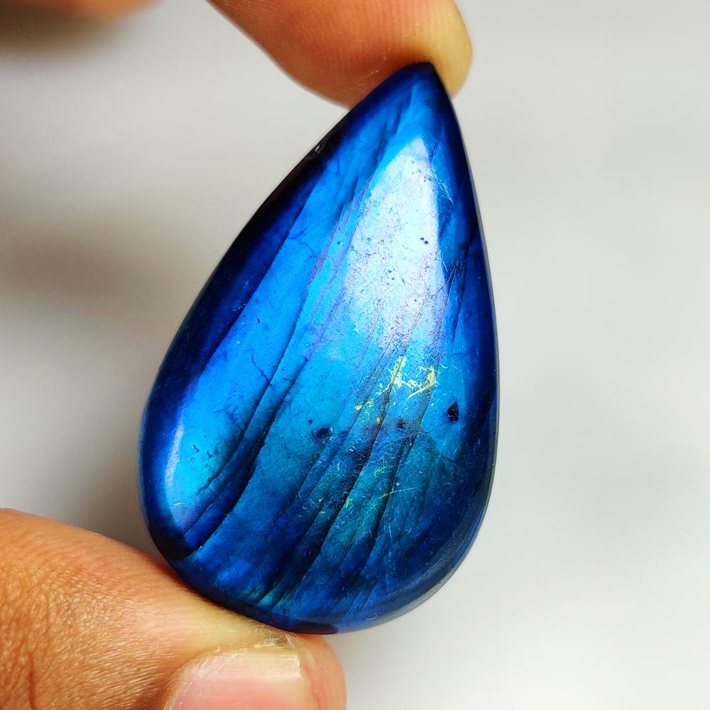 61.63 Ct Natural Blue Flashing Lapis Lazuli Pear Cab (1 of 2)