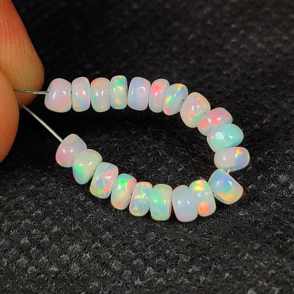 4.46 Ct Natural Multicolor FIre Opal Round Beads: Weight - 4.46 Ct / Dimensions - 4.00 - 4.20 mm / 20 Pc's / Shape & Cut - Drilled Round Beads / Color - Multicolor Transparency - Translucent / Origin - Ethiopia / Comments - None