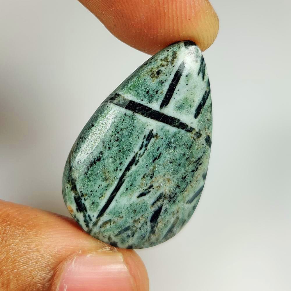 23.05 Ct Natural Horn Belende Pear Cab: weight - 23.05 Ct / Dimensions - 30.00 x 19.20 x 5.00 mm/ Shape & Cut - Excellent Pear Cab / Origin - Brazil / Comments - None