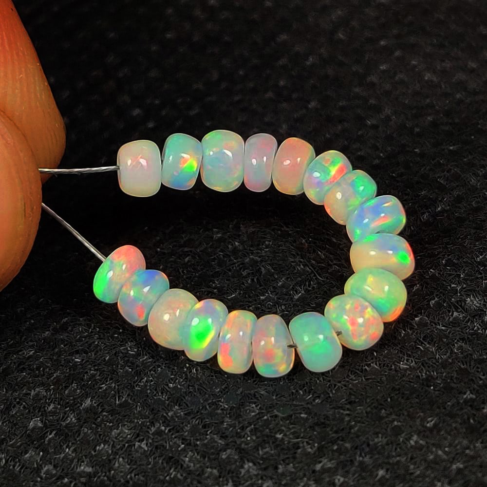 4.40 Ct Natural Multicolor FIre Opal Round Beads: Weight - 4.40 Ct / Dimensions - 4.10 - 4.40 mm / 18 Pc's / Shape & Cut - Drilled Round Beads / Color - Multicolor Transparency - Translucent / Origin - Ethiopia / Comments - None