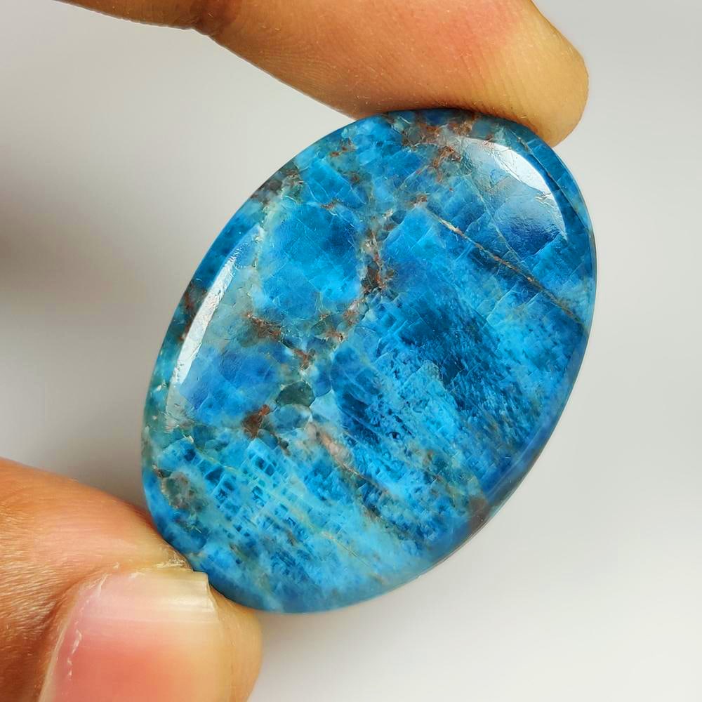49.61 Ct Natural Blue Apatite Oval Cab (1 of 2)