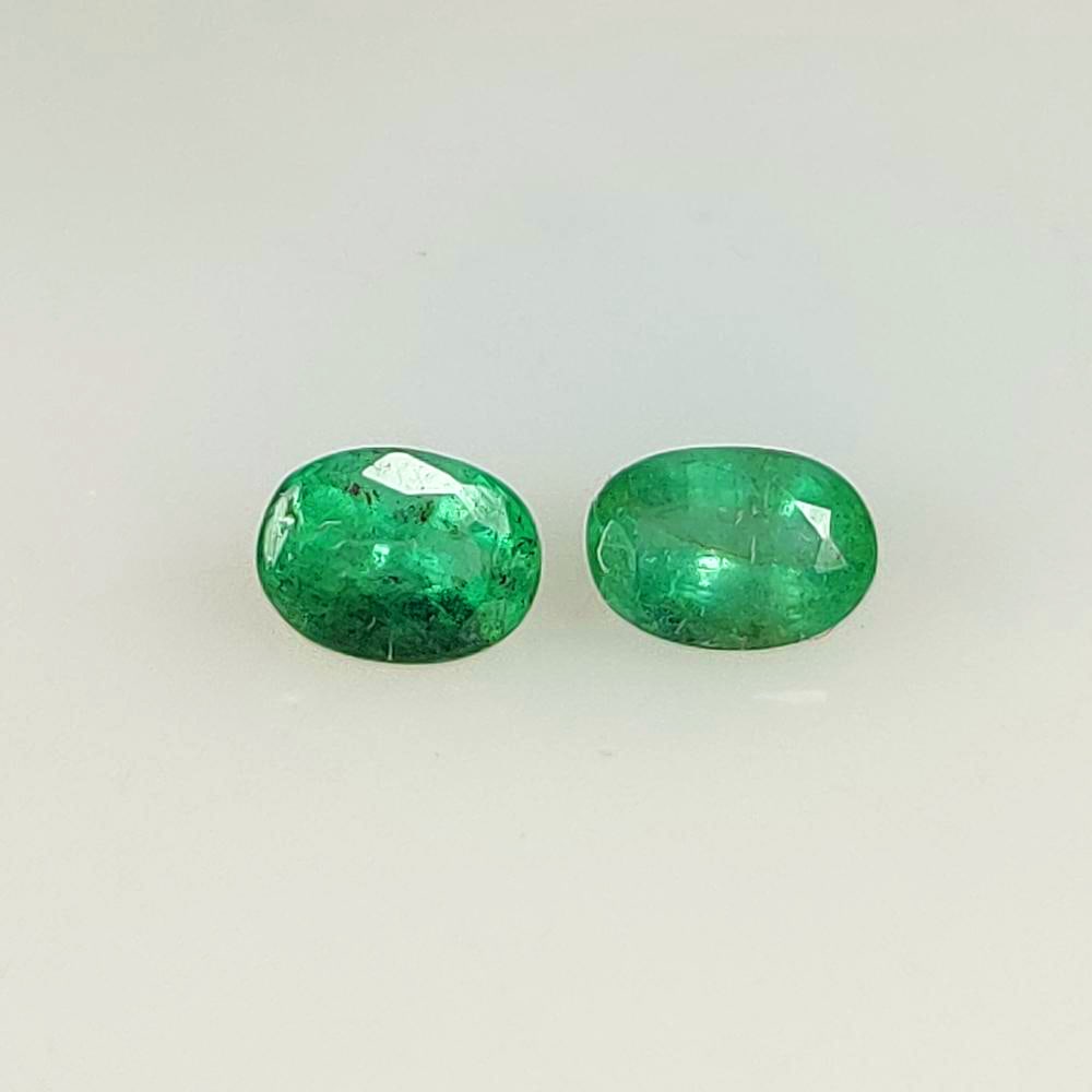 0.86 Ct Natural Zambian Green Emerald Oval Pair (1 of 2)