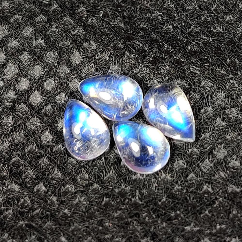1.53 Ct Natural Blue Tint Moonstone Pear Cab Set: Weight - 1.53 Ct / Dimensions - 6.00 x 4.00 - 6.10 x 4.10 mm / 4 Pc's / Shape - Pear Cab / Clarity -Transparent / Origin - India / Treatment - None