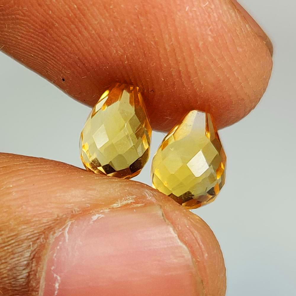 2.64 Ct Natural Yellow Citrine Pear Briolette Pair: Weight - 2.64 Ct / Dimensions - 7.30 x 5.30 mm / 2 Pc's / Shape - Pear Beads / Color - Yellow / Clarity - VVS / Origin - Brazil / Treatment - Heated