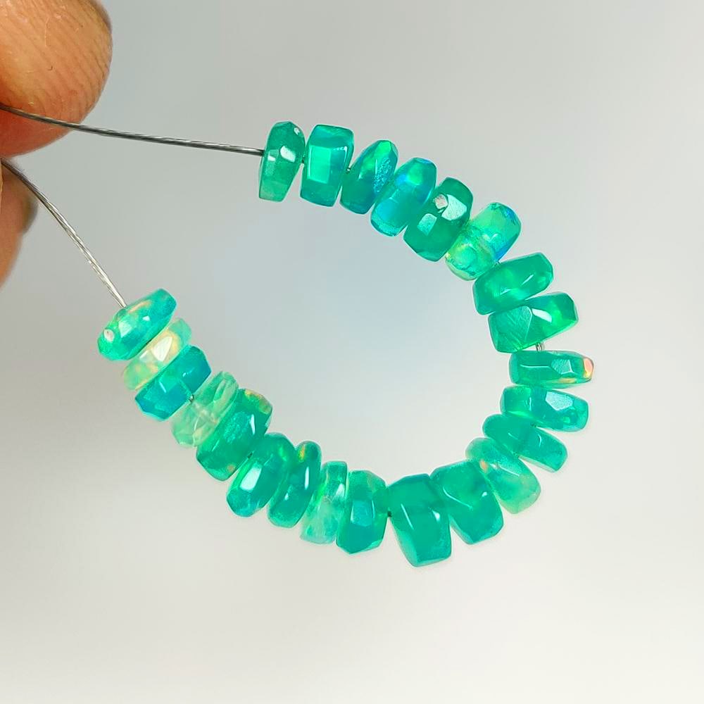 3.67 Ct Natural Green Fire Opal Drilled Beads: Weight - 3.67 Ct / Dimensions - 3.80 - 4.40 mm / 23 Pc's / Shape - Round Beads / Color - Green / Clarity - Transparent / Origin - Ethiopia / Treatment - Heated