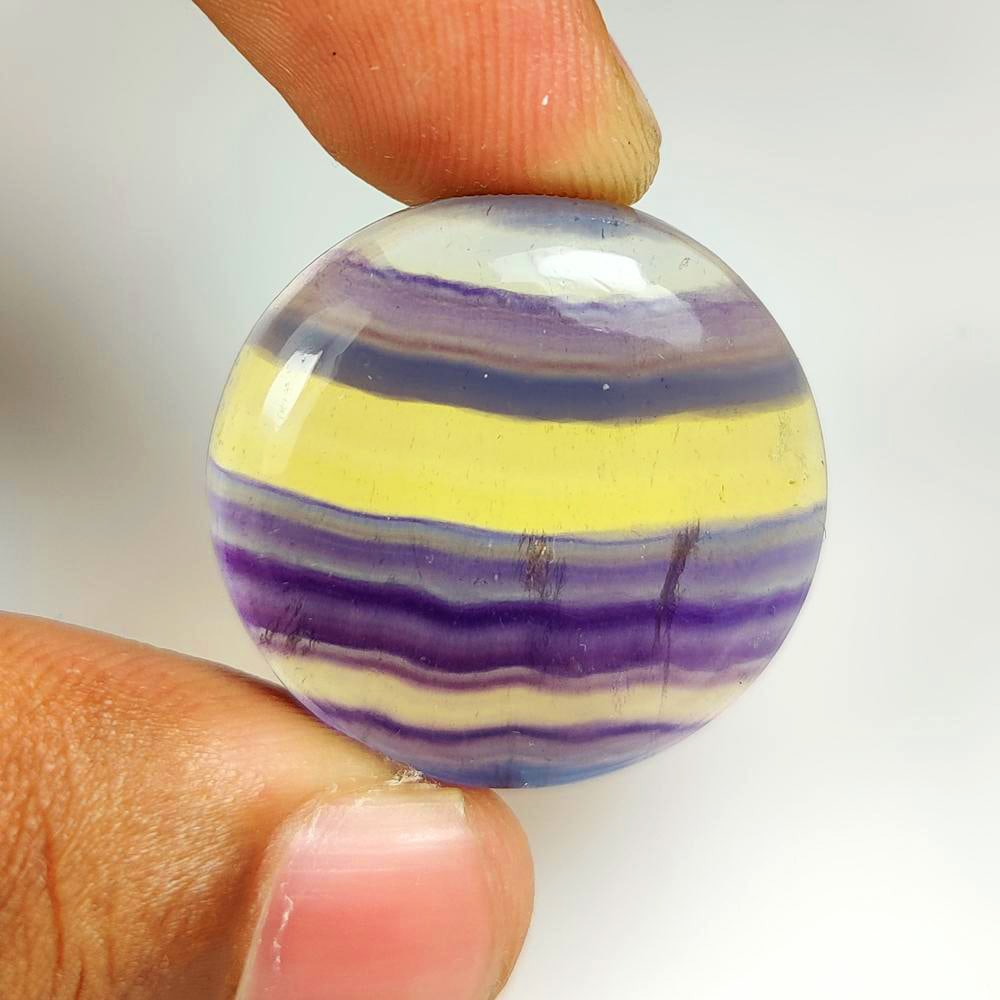 50.89 Ct Natural Multi-Color Fluorite Round Cab: Weight - 50.89 Ct / Dimensions - 29.00 x 29.00 x 7.00 mm / Shape - Round Cab / Color - Multi-Color / Clarity - VVS / Origin -Brazil / Treatment - None