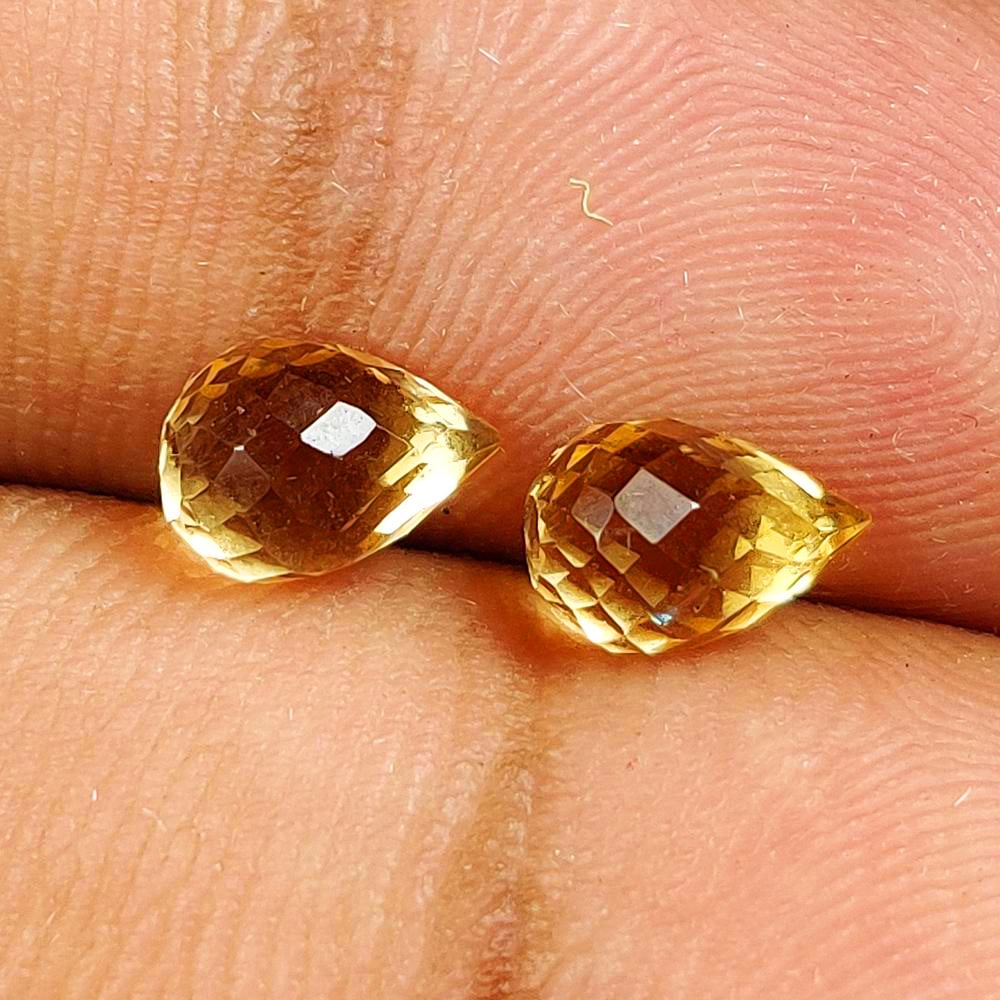 1.94 Ct Natural Yellow Citrine Pear Briolette Beads Pair: Weight - 1.94 Ct / Dimensions - 7.00 x 5.00 mm / 2 Pc's / Shape - Pear Beads / Color - Yellow / Clarity - VVS / Origin - Brazil / Treatment - Heated