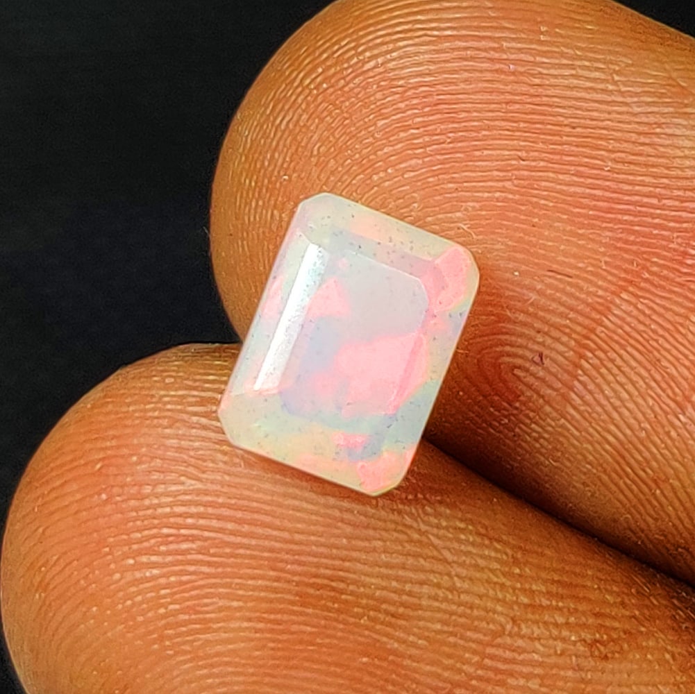 1.13 Ct Natural Multicolor Welo Opal Fire Emerald Cut (1 of 2)