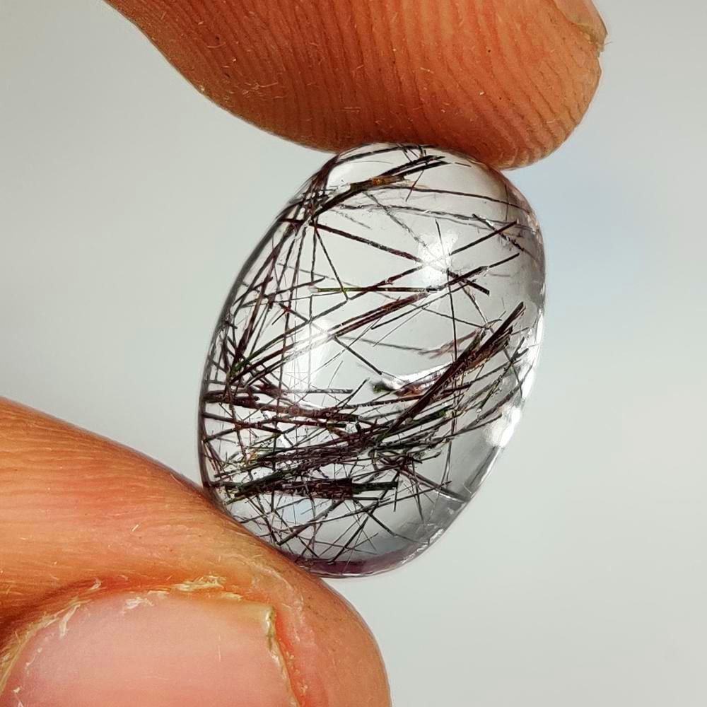 9.49 Ct Natural Horse Hair Rutile Quartz Oval Cab: Weight - 9.49 Ct / Dimensions - 16.30 x 11.40 x 7.30 mm / Shape & Cut - Oval Cab / Transparency - Transparent / Origin - India / Comments - None