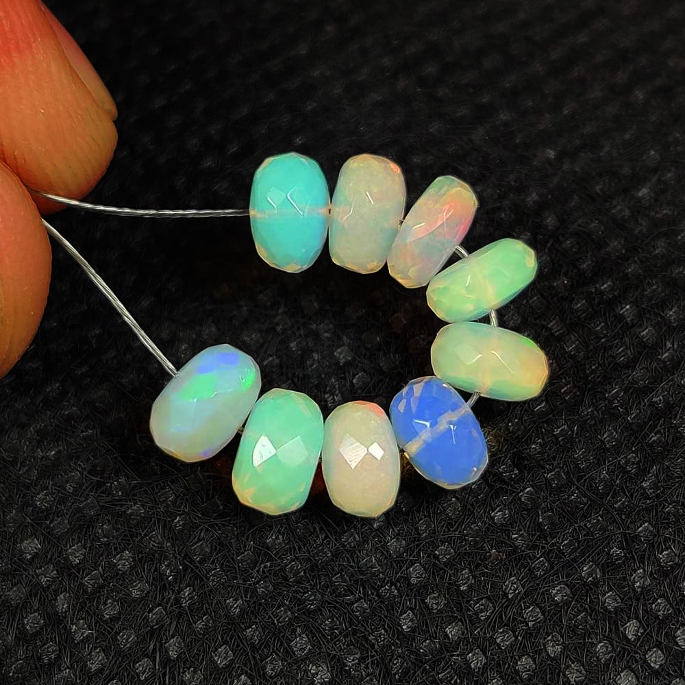 6.02 Ct Natural Multicolor Welo Opal Flash Fire Round Faceted Beads: Weight - 6.02 Ct / Dimensions - 5.80 - 6.20 mm / 9 Pc's / Shape & Cut - Round Beads / Color - Multicolor / Transparency - Translucent / Origin - Ethiopia / Comments - None