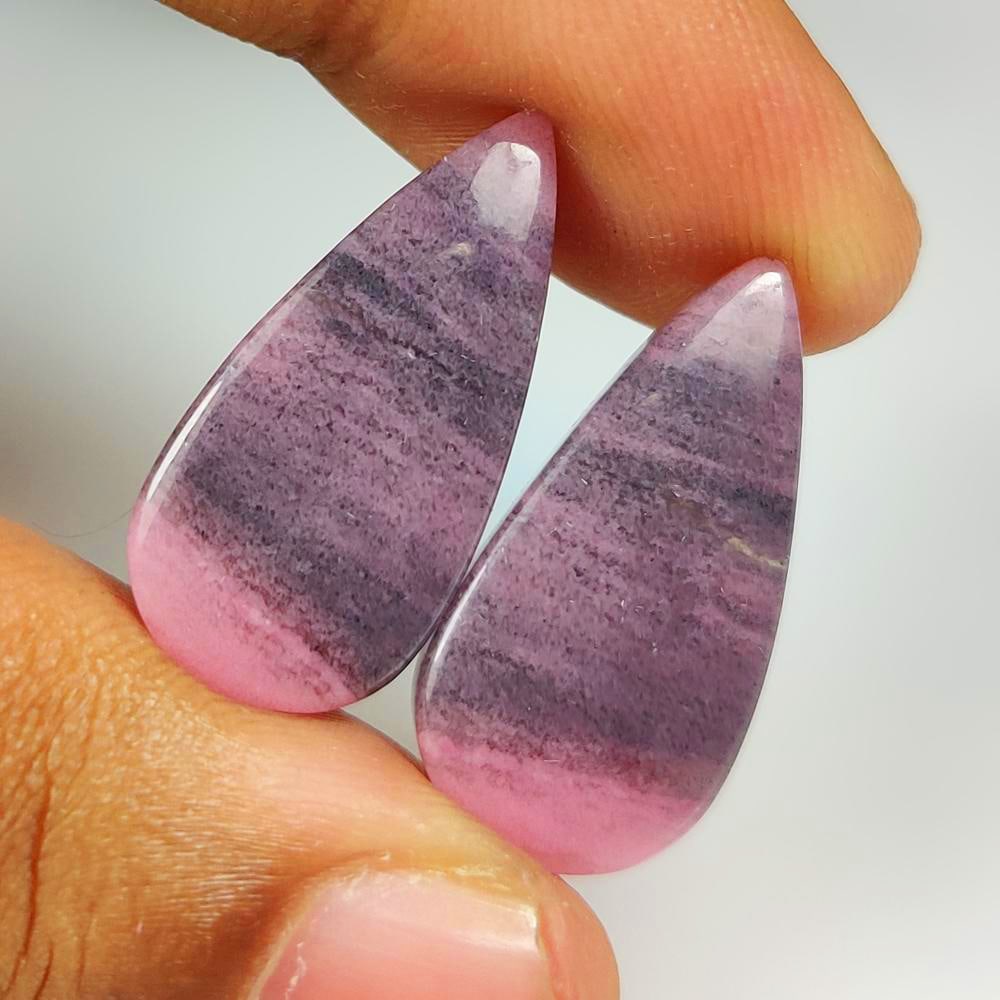 24.60 Ct Natural Pink Potch Opal Pear Pair: weight - 24.60 Ct / Dimensions - 26.00 x 12.20 x 4.40 mm / Shape & Cut - Excellent Pear Cab / Origin - Brazil / Comments - None