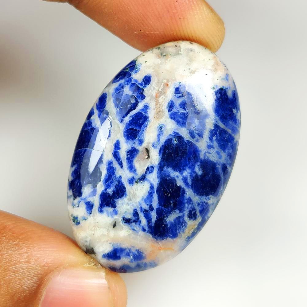 48.79 Ct Natural Blue Sodalite Oval Cab: Weight - 48.79 Ct / Dimensions - 40.00 x 26.00 x 7.20 mm / Shape - Oval Cabochon / Color - Blue / Clarity - Opaque / Origin -Brazil / Treatment - None