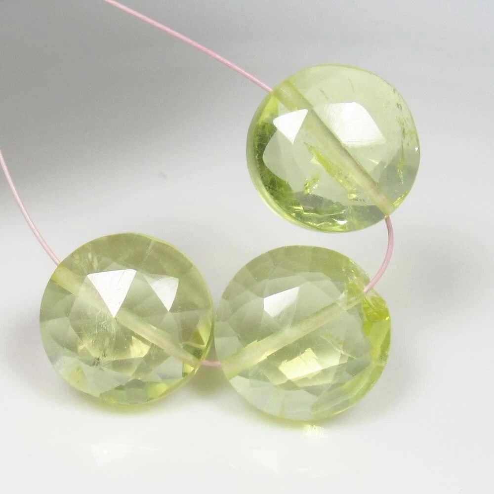 12.80 Ct Natural Lemon Quartz Round Cut Beads: Weight - 12.80 Ct / Dimensions - 10.00 - 10.10 mm / 3 Pc's / Top Quality Luster / Excellent Round Cut Beads / Origin - Brazil / Comments - Heated