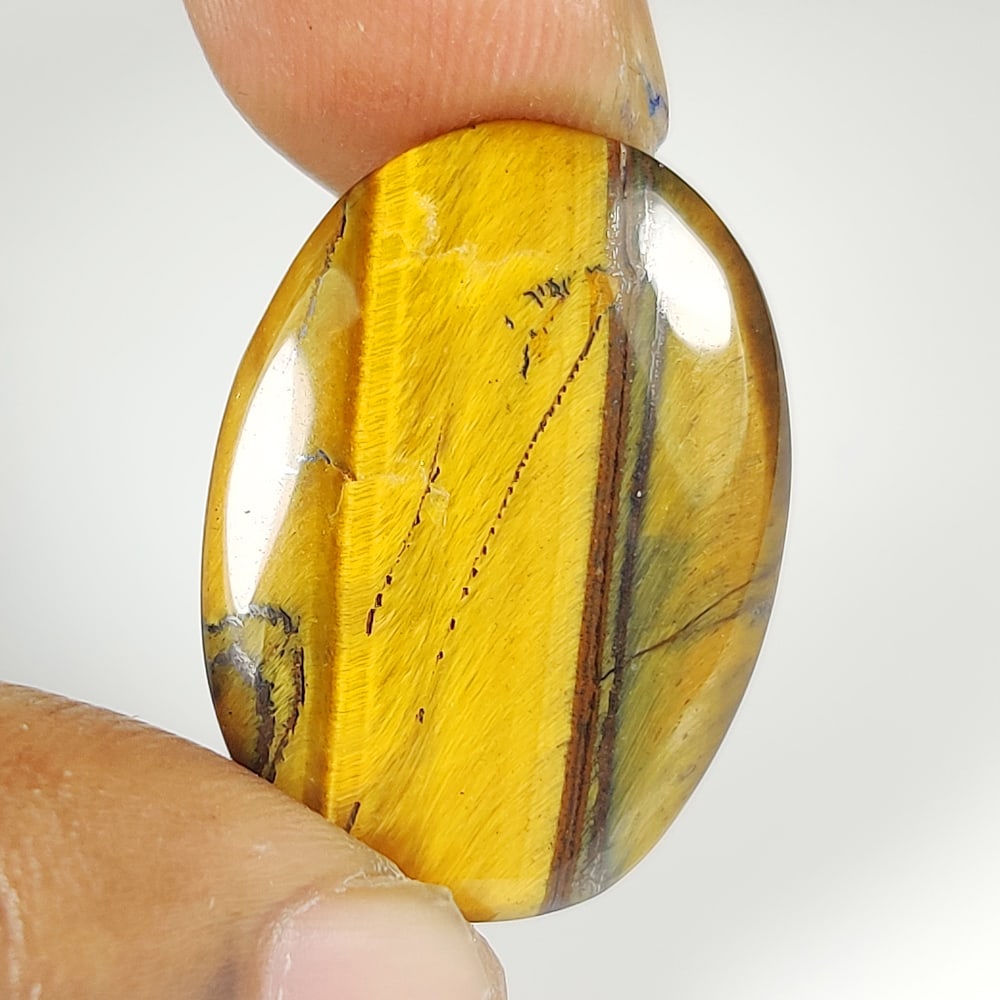 13.08 Ct Natural Tiger Eye Oval Cab (1 of 2)