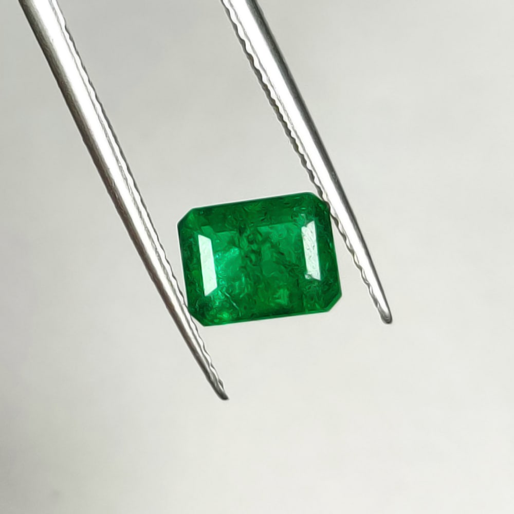 1.44 Ct Natural Zambian Top Vivid Green Emerald-Octagon Cut: Weight - 1.44 Ct / Dimensions - 7.50 x 6.00 x 4.00 mm/ Shape - Octagon Cut / Color - Green / Clarity - SI / Origin - Zambia / Treatment - Natural Emeralds are commonly enhanced by oil