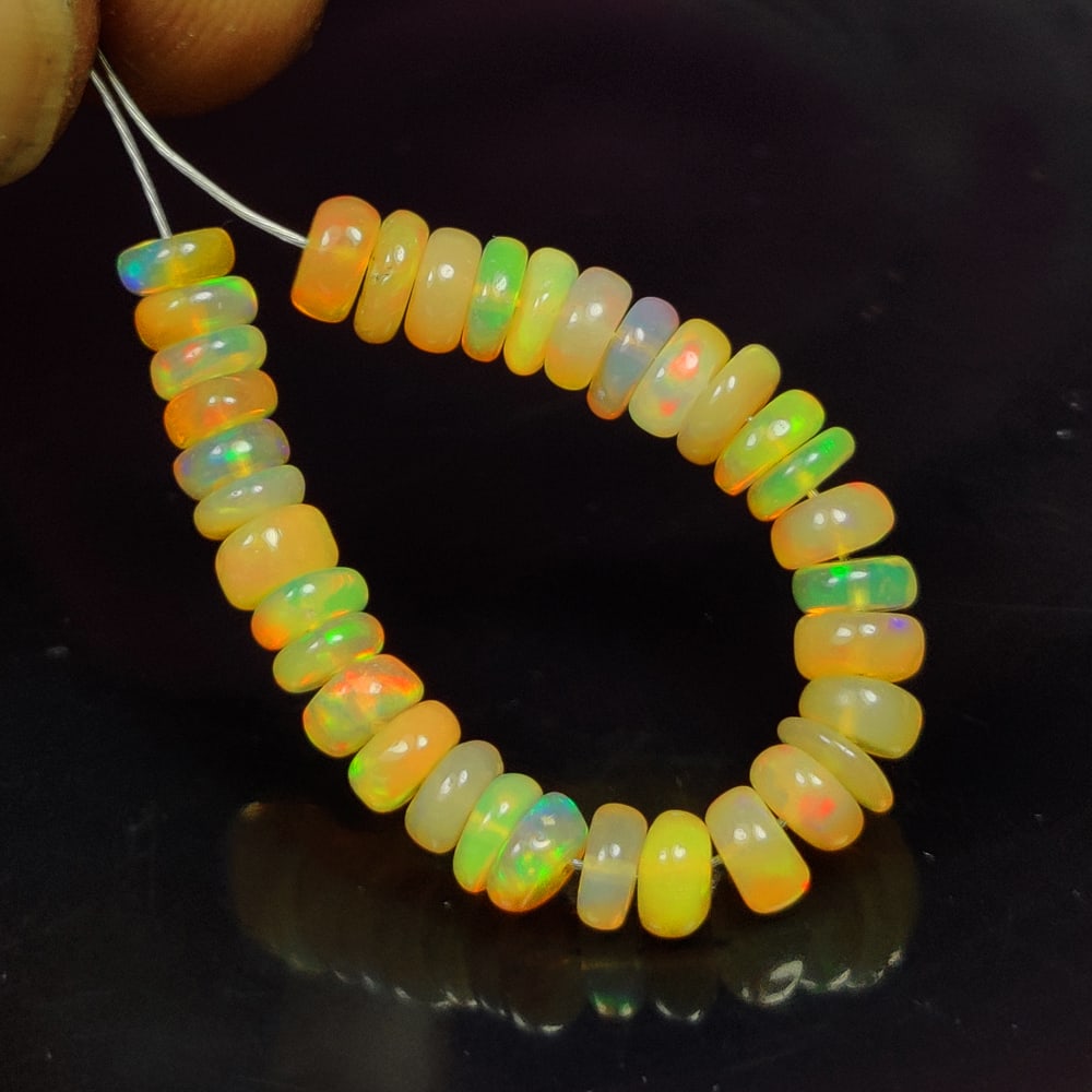 6.49 Ct Natural Multi-Color Welo Opal Round Beads (1 of 2)