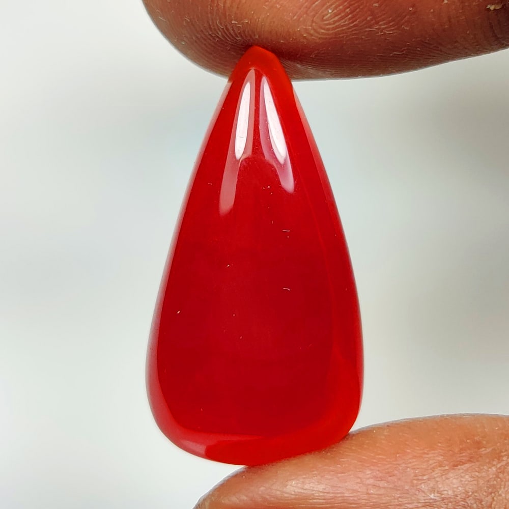 18.67 Ct Natural Deep Orange Onyx Pear Cab (1 of 2)