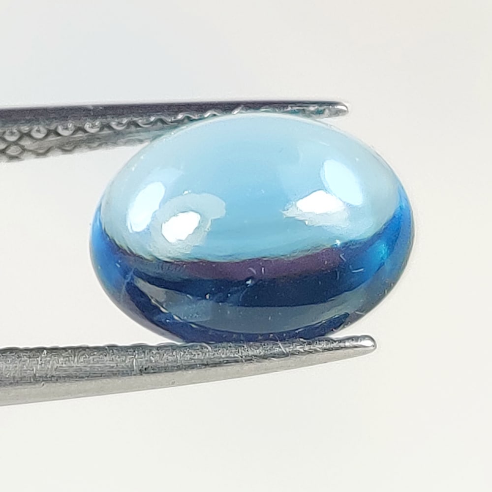 3.13 Ct Natural Blue Topaz Oval Cab (1 of 2)