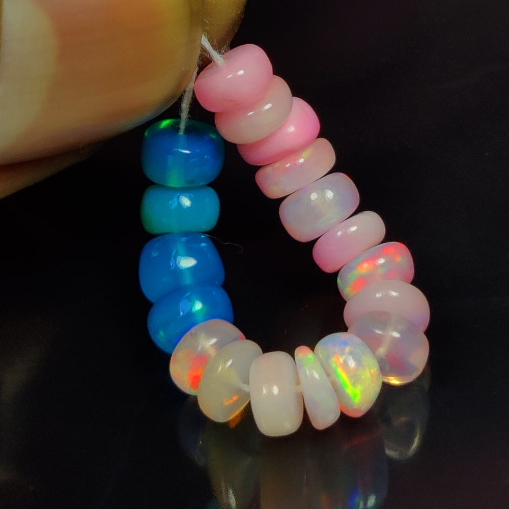 6.67 Ct Natural Blue & Pink Fire Opal Round Beads: Weight - 6.67 Ct / Size - 5.00 - 5.40 mm / 18 Pc's / Shape - Round Beads / Color - Blue & Pink / Clarity - Translucent / Origin - Ethiopia / Treatment - Color Heated
