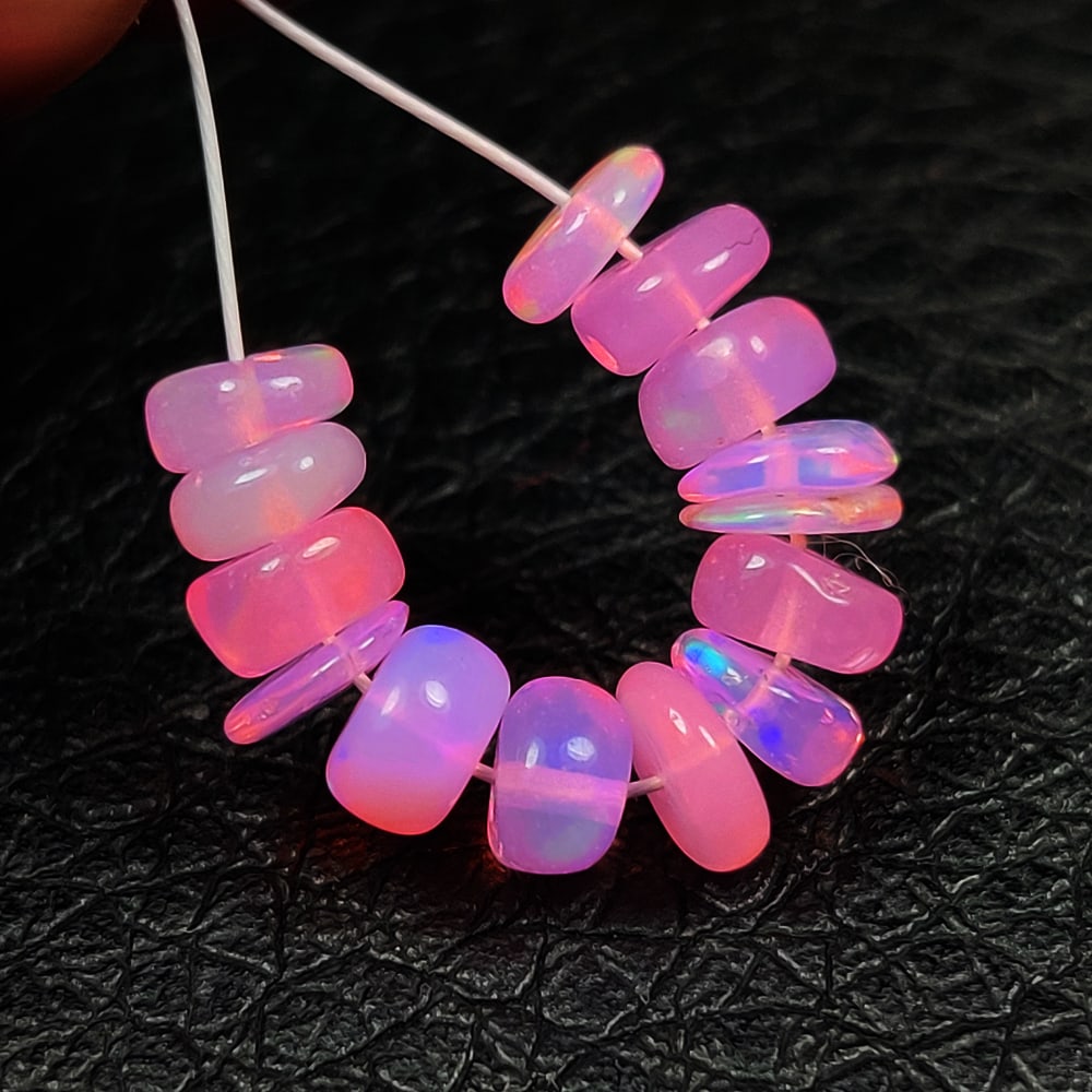 3.18 Ct Natural Pink Fire Opal Drilled Beads: Weight - 3.18 Ct / Dimensions - 4.60 - 5.00 mm / 14 Pc's / Shape - Round Beads / Color - Pink / Clarity - Transparent / Origin - Ethiopia / Treatment - Heated