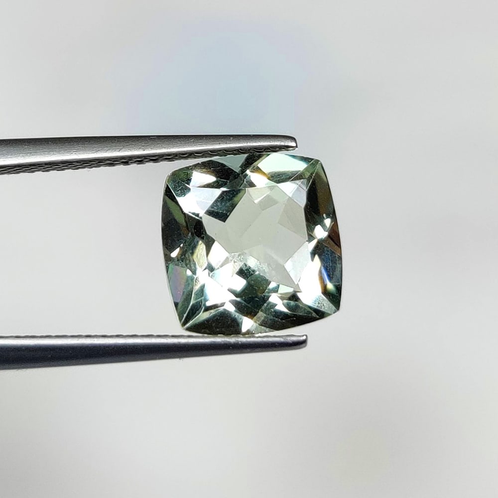 4.05 Ct Natural "Prasiolite" (Green Amethyst)Cushion Cut: Weight - 4.05 Ct / Dimensions - 10.20 x 10.10 x 6.50 mm / Shape - Cushion Cut / Color - Green / Clarity - VVS / Origin -Brazil / Treatment - Heated