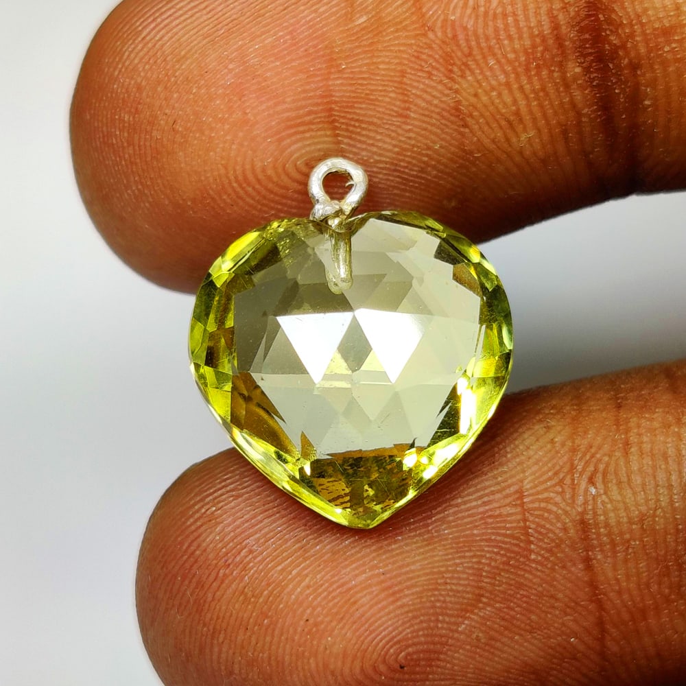 10.95 Ct Natural Lemon Quartz Lovely Heart Pendent: Weight - 10.95 Ct / Dimensions - 15.00 x 14.90 x 8.00 mm / Shape - Heart Cut / Clarity - Transparent / Origin - Brazil / Treatment - Heated