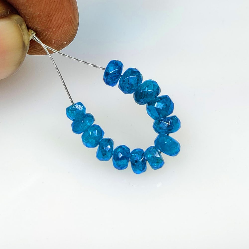 5.14 Ct Natural Neon Blue Apatite Round Drilled Beads (1 of 2)