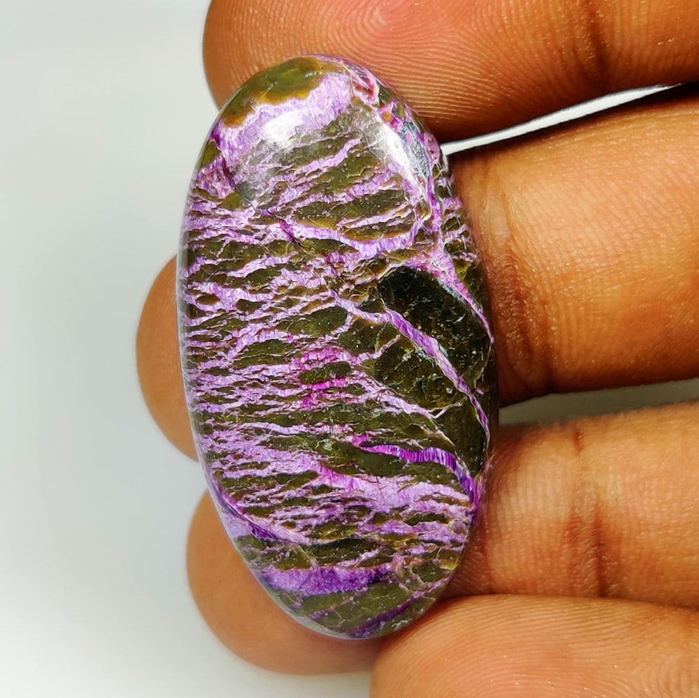 32.68 Ct Natural Purple Stichite Oval Cab: weight - 32.68 Ct / Dimensions - 38.00 x 19.80 x 6.20 mm / Shape & Cut - Excellent Oval Cab / Origin - Brazil / Comments - None