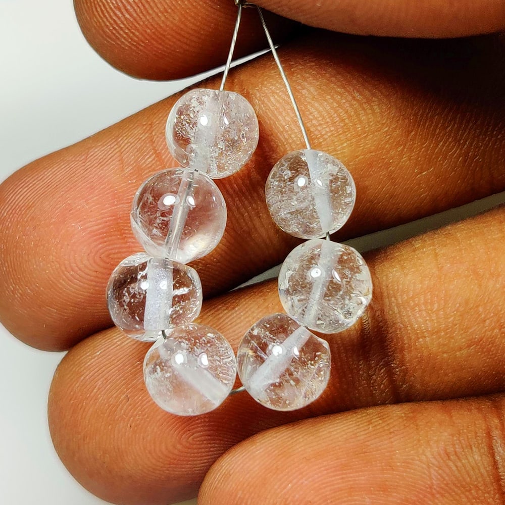17.62 Ct Natural Colorless Quartz Round Beads: Weight -17.62 Ct / Dimensions - 7.10 - 7.40 mm / 7 Pc's / Shape & Cut - Round Beads / Color - White / Transparency - VVS / Origin - Brazil / Comments - None