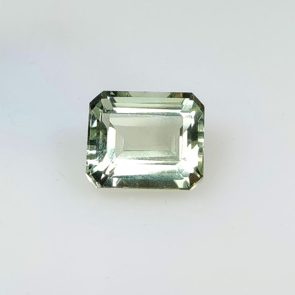 6.85 Ct Natural "Prasiolite" (Green Amethyst) Emerald Cut: Weight - 6.85 Ct / Dimensions - 12.00 x 10.00 x 7.30 mm / Shape - Emerald Cut / Color - Green / Clarity - VVS / Origin - Brazil / Treatment - Heated