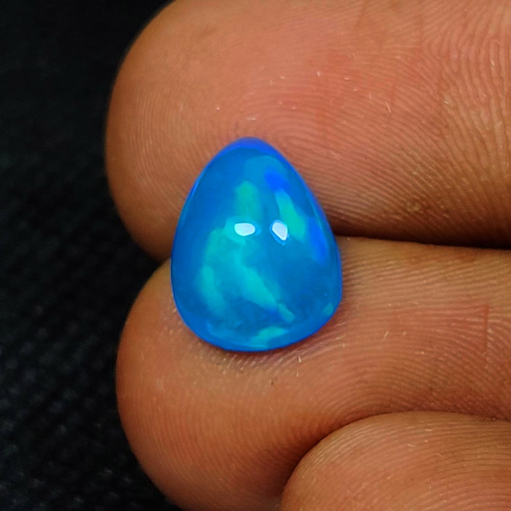 2.30 Ct Natural Blue Fire Opal Pear Cab (1 of 2)
