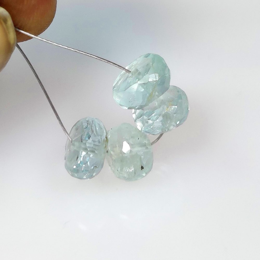 7.25 Ct Natural Blue Aquamarine Round Cut Beads: Weight - 7.25 Ct / Dimensions - 7.20 - 7.70 mm / 4 Pc's / Shape - Round Cut Beads / Color - Baby Blue / Clarity - VVS / Origin -India / Treatment - None