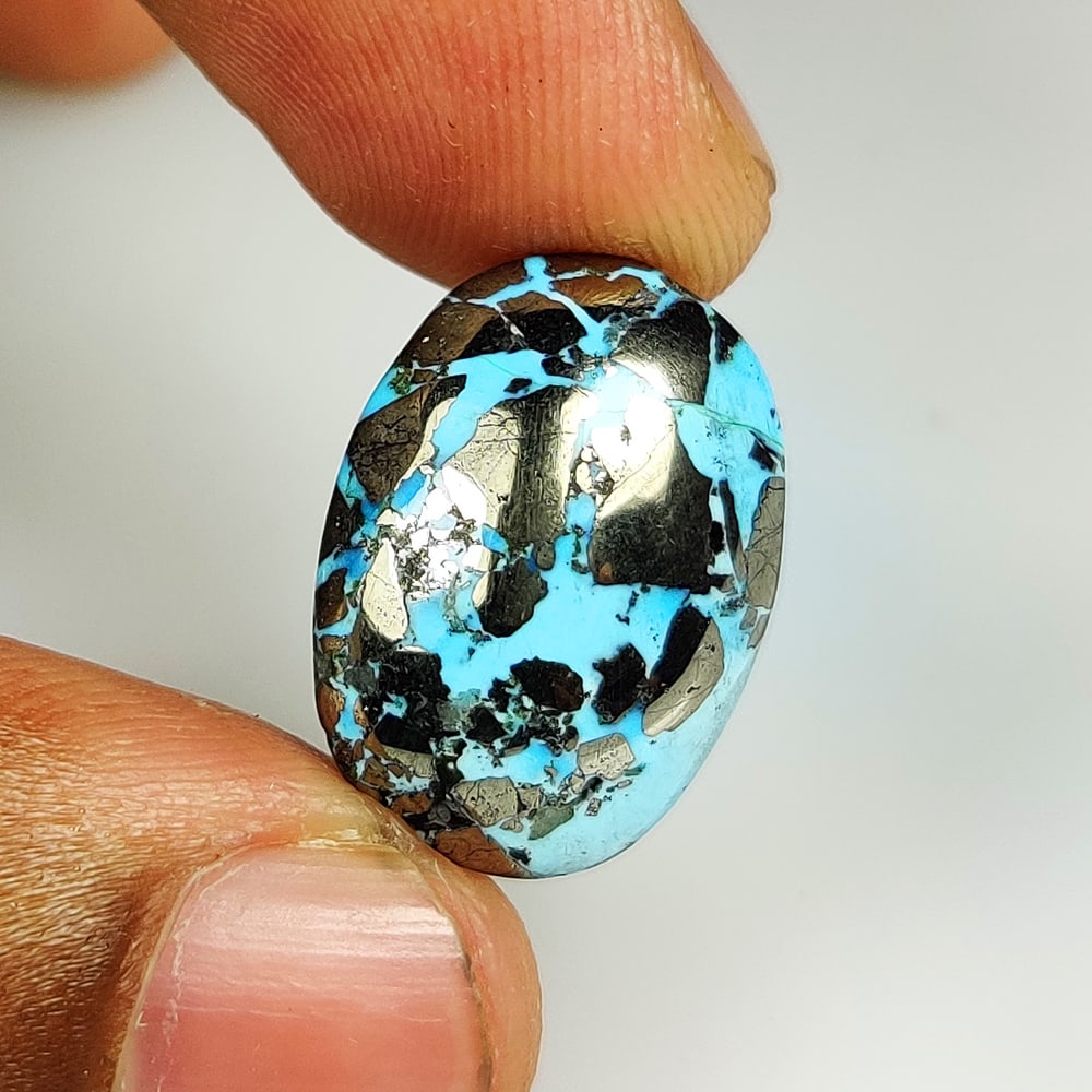 23.76 Ct Natural Metal Turquoise Oval Cab (1 of 2)
