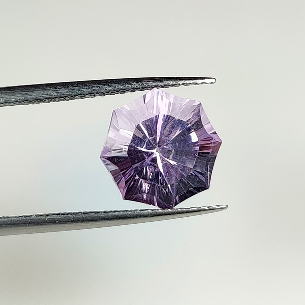 3.37 Ct Natural Purple Amethyst Fancy Cut: Weight - 3.37 Ct / Dimensions - 10.50 x 9.70 x 7.20 mm / Shape - Fancy Cut / Color - Purple / Clarity - Translucent / Origin - Brazil / Treatment - Heated