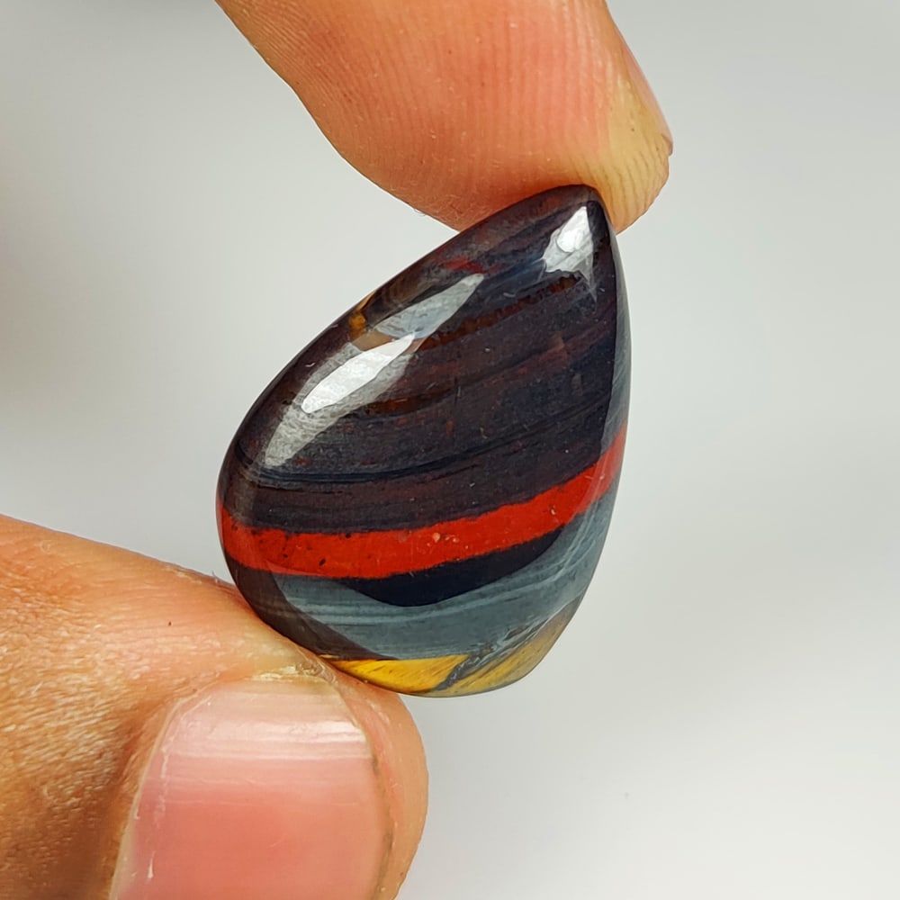 17.61 Ct Natural Iron Tiger Eye Pear Cab (1 of 2)