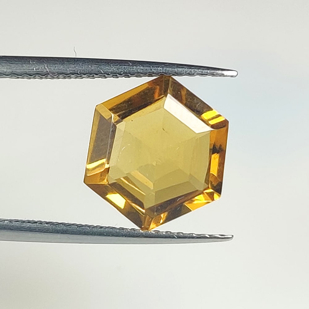 3.07 Ct Natural Yellow Citrine Hexagon Cut: Weight - 3.07 Ct / Size - 11.60 x 10.00 x 5.00 mm / Shape - Hexagon Cut / Color - Yellow / Clarity - VVS / Origin - Brazil / Treatment - Heated