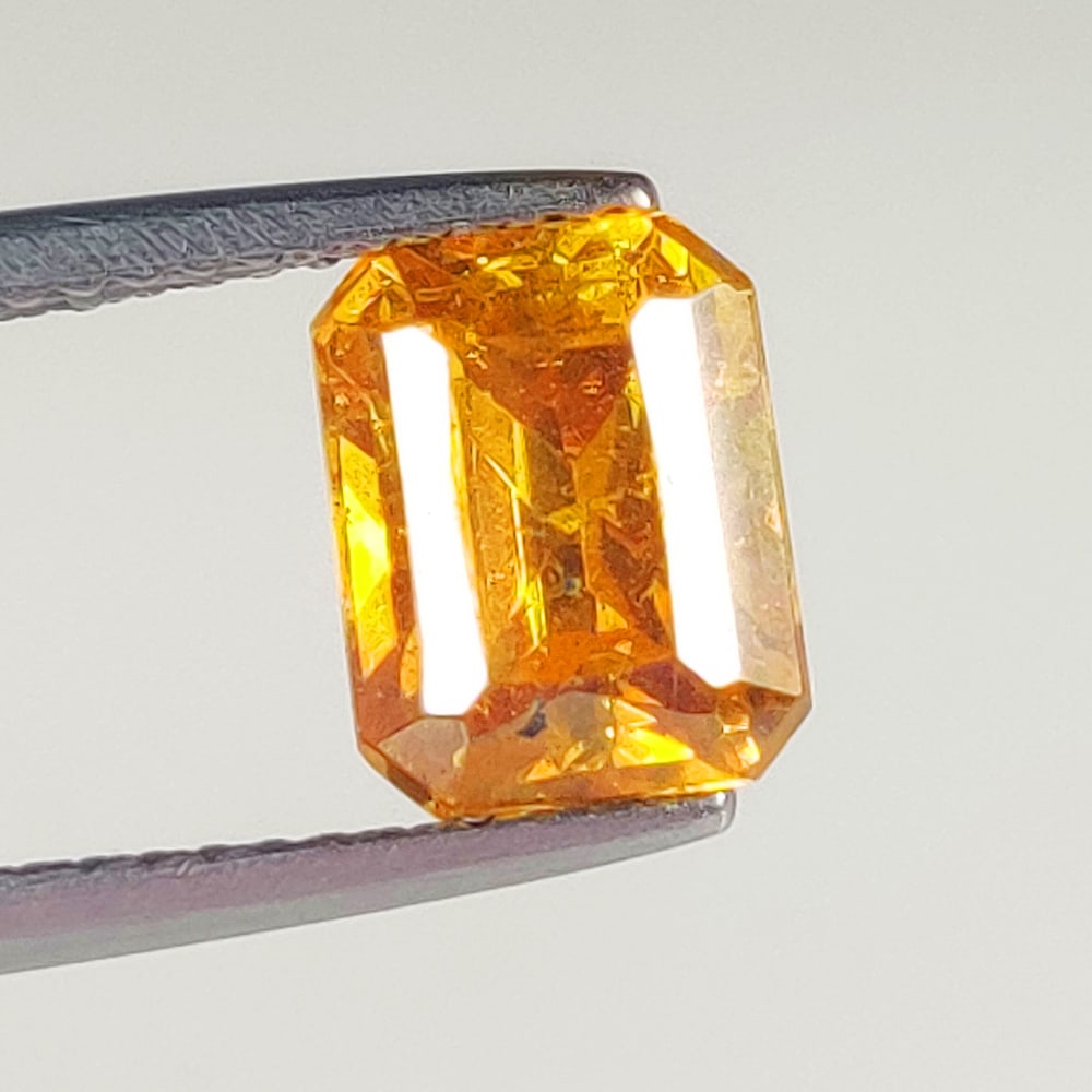 3.00 Ct Natural Orange Sphalarite Emerald Cut: Weight - 3.00 Ct / Size - 8.50 x 6.70 x 5.20 mm / Shape - Emerald Cut / Color - Orange / Clarity - VVS / Origin - Russia / Treatment - None
