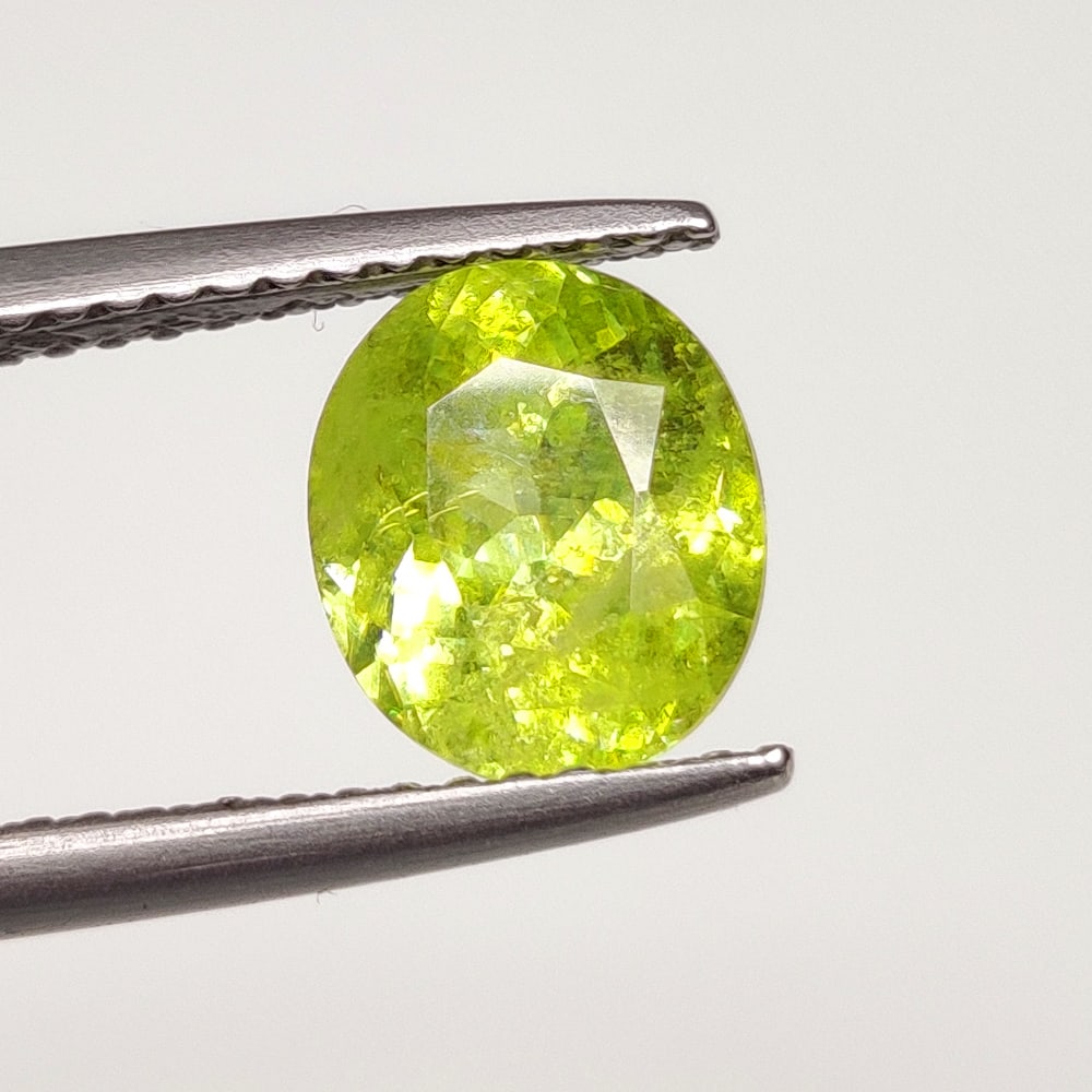 1.92 Ct Natural Sphene Oval Cut: Weight : 1.92 Ct / Dimensions : 8.30 x 7.00 x 4.50 mm / Shape : OVal Faceted / Color : Yellowish Green / Transparency : Transparent / Treatment : No any treatment
