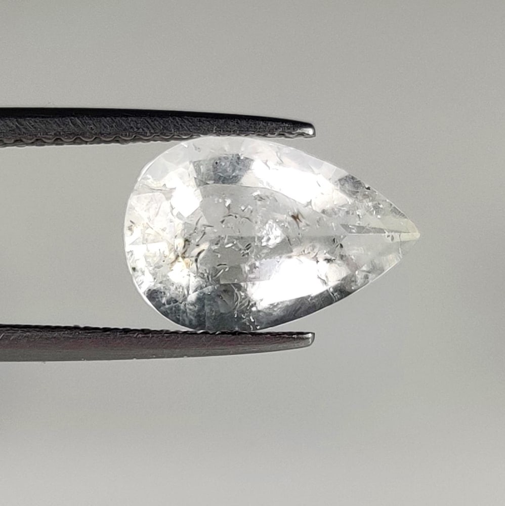 3.02 Ct Natural Hyalite Opal Pear Cut: Weight - 3.02 Ct / Size - 13.30 x 9.00 x 6.30 mm / Shape - Pear Cut / Color - White / Clarity - VVS / Origin - Brazil / Treatment - None