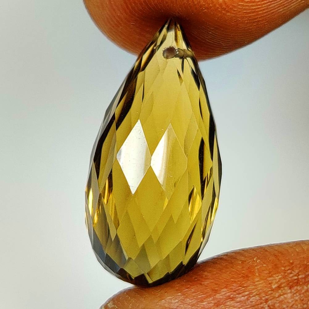 13.06 Ct Natural Yellow Citrine Drilled Pear Drop: Weight - 13.06 Ct / Dimensions -20.90 x 10.30 x 10.30 mm / Shape & Cut - Drilled Pear Drop / Color - Yellow / Clarity - VVS / Origin - Brazil / Comments - Heated