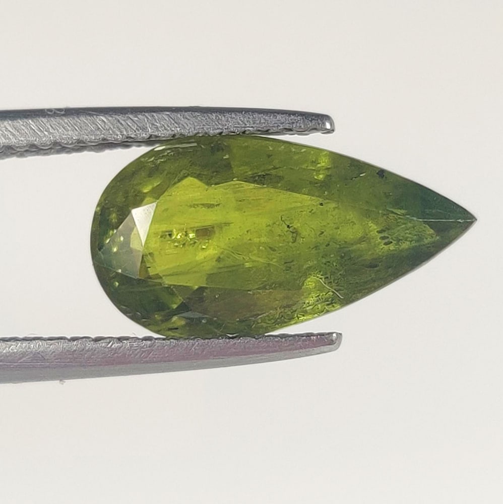 3.80 Ct Natural Green Sapphire Pear Cut: Weight - 3.80 Ct / Dimensions- 13.50 x 7.30 x 4.10 mm / Shape - Pear Cut / Clarity - SI / Origin - Sri Lanka / Treatment - Standard Heated