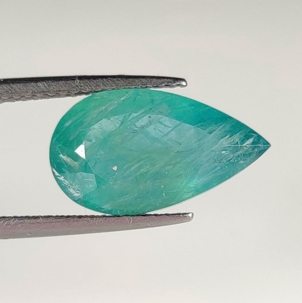 5.37 Ct Natural Grandidierite Pear Cut: Weight - 5.37 Ct / Dimensions - 17.00 x 9.90 x 6.50 mm / Shape - Pear Cut / Clarity - Opaque / Origin - Madagascar / Treatment - None
