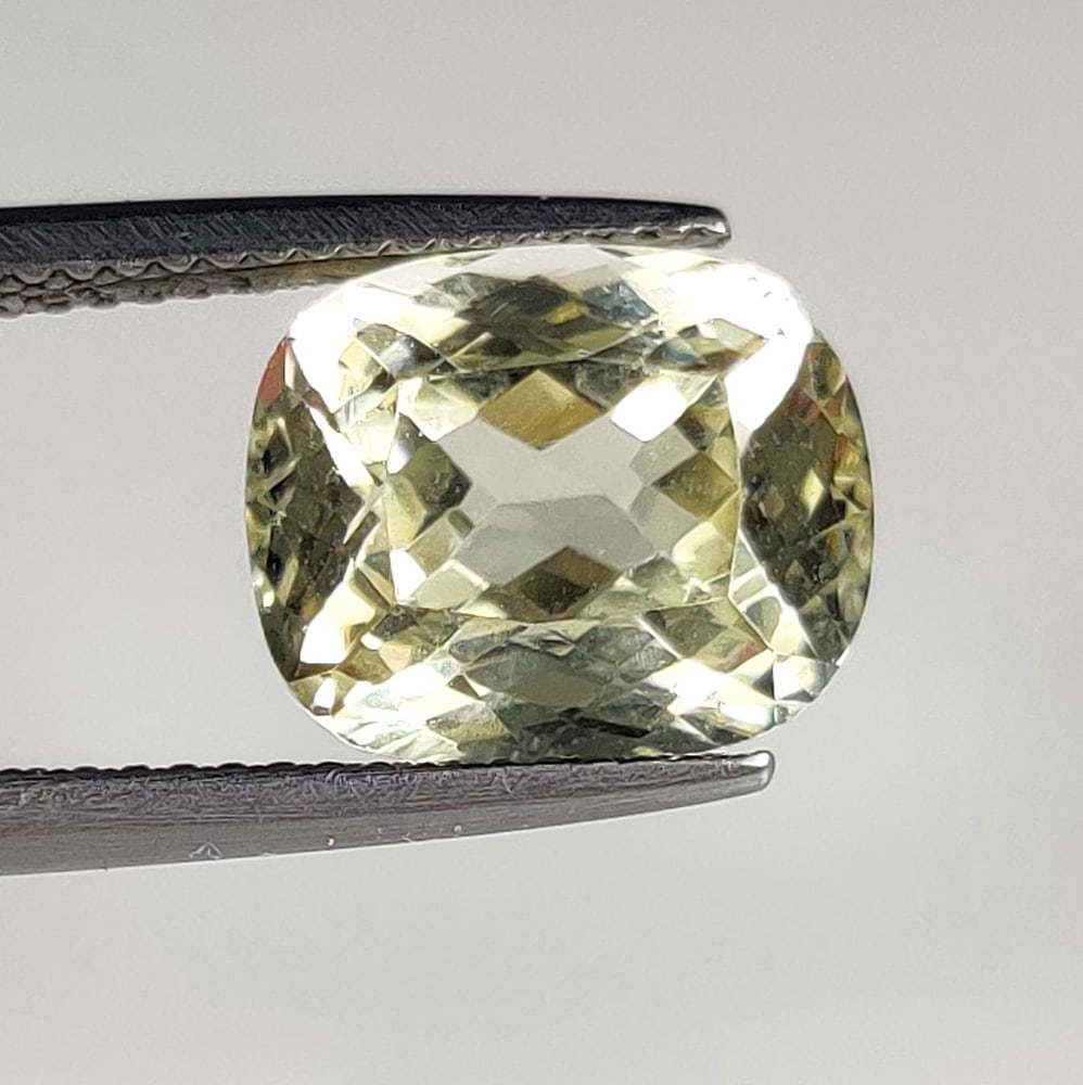 6.47 Ct Natural Yellow Kunzite Cushion Cut: Weight - 6.47 Ct / Dimensions -11.50 x 10.00 x 8.00 mm / Shape - Cushion Cut / Color - Yellow / Clarity - VVS / Origin - Afghanisthan / Treatment - None