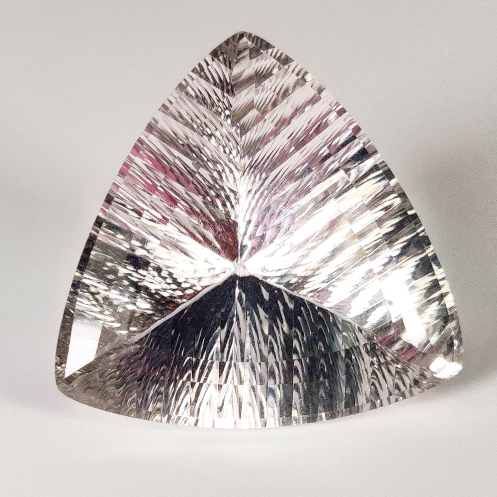 35.46 Ct Natural Colorless Quartz Trillion Cut: Weight - 35.46 Ct / Dimensions - 25.00 x 25.00 x 13.50 mm / Shape & Cut - Trillion Cut / Color - White / Transparency - VVS / Origin - Brazil / Comments - None