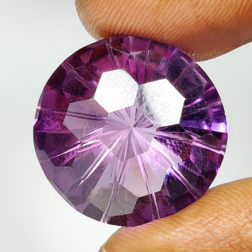 18.60 Ct Natural Purple Amethyst Round Football Cut: Weight - 18.60 Ct / Size - 18.70 x 18.70 x 10.80 mm / Shape - Round Cut / Color - Purple / Clarity - VVS / Origin -Brazil / Treatment - Heated