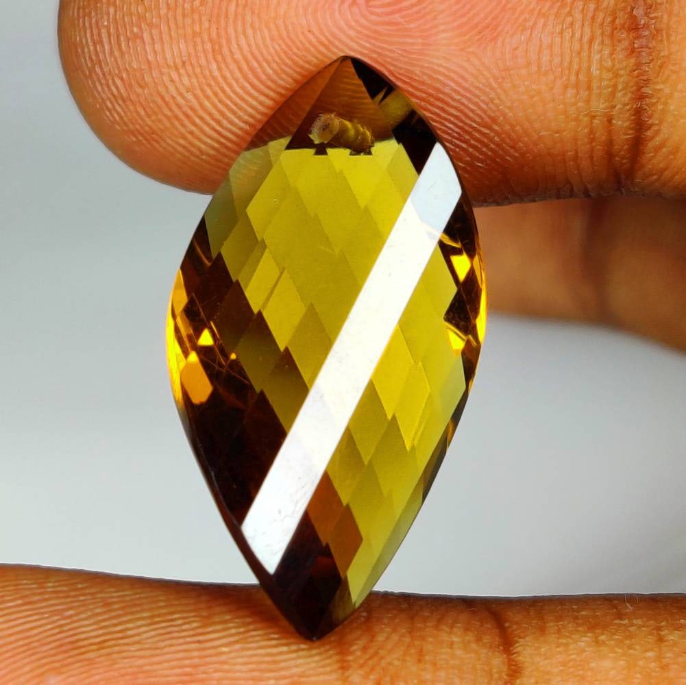 13.67 Ct Natural Honey Quartz Fancy Shape Drilled Beads: Weight - 13.67 Ct / Dimensions - 26.00 x 13.40 x 7.20 mm / Shape & Cut - Oval Drilled Cut / Color - Yellow / Clarity - VVS / Origin - Brazil / Comments - None