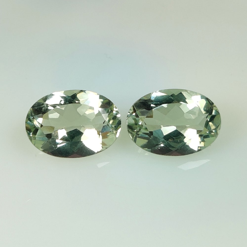 10.33 Ct Natural Green Amethyst Oval Cut Pair: Weight - 10.33 Ct / Size - 14.20 x 10.10 x 6.50 mm / 2 Pc's / Shape - Oval Cut / Color - Green / Clarity - VVS / Origin - Brazil / Treatment - Heated