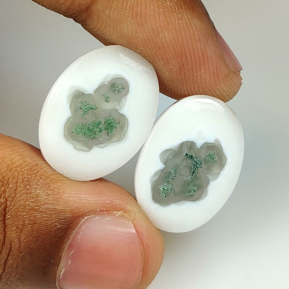 20.69 Ct Natural Solar Moss Eye Agate Oval Cab Pair: Weight - 20.69 Ct / Dimensions - 20.00 x 14.90 x 3.80 mm / 2 Pc's / Shape - Excellent Oval Cab / Clarity - Opaque / Origin - Brazil / Treatment - None