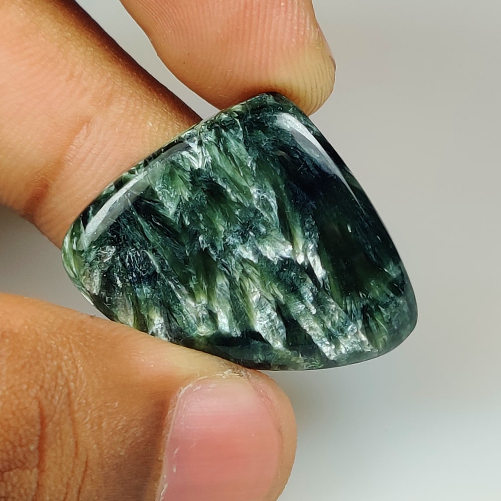 31.13 Ct Natural Seraphinite Pear Cab (1 of 2)